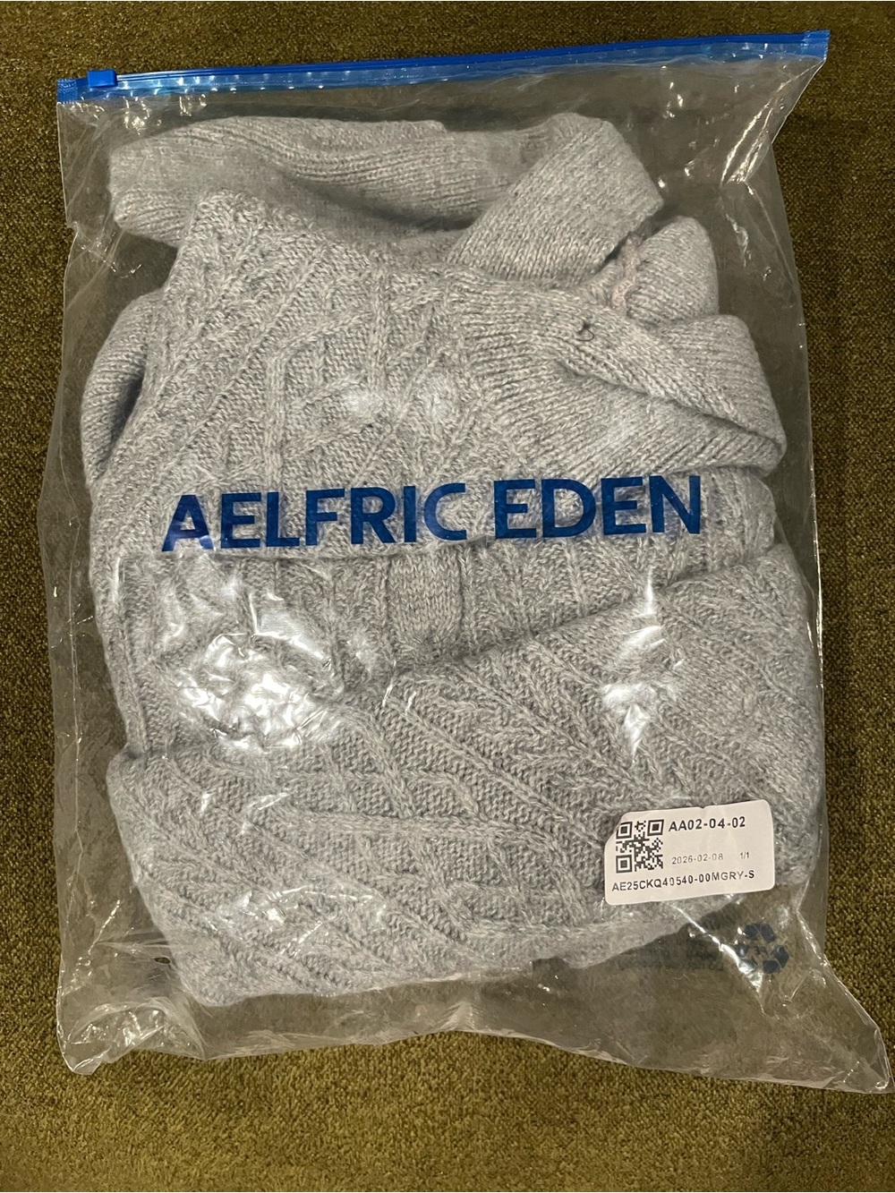 Aelfric Eden Light Gray Off-the-Shoulder Cable Knit Sweater